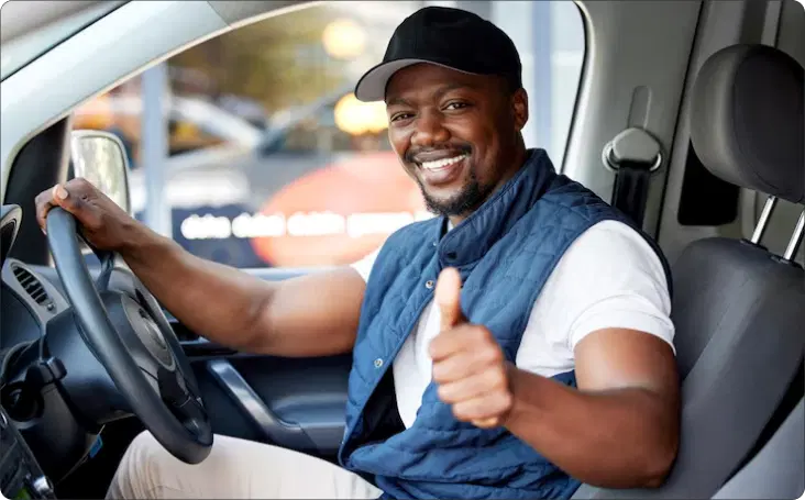 Professional driver ready to assist passengers